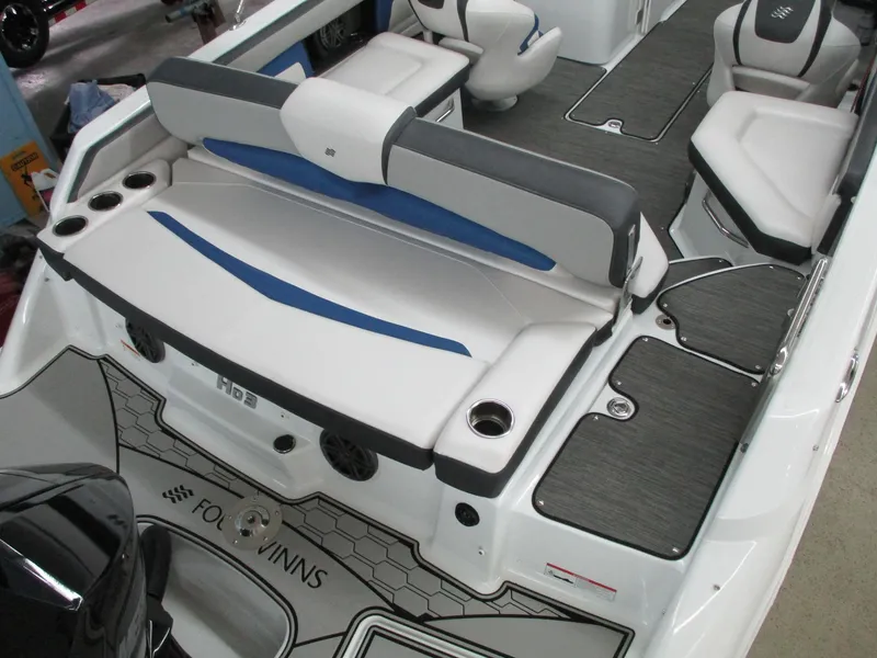 Slide: The Image of Interior of a 2021 Four Winns HD3 RS boat with gray and blue seating. - 5