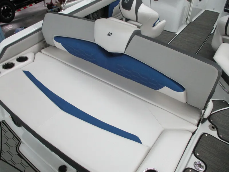 Slide: The Image of Interior of a 2021 Four Winns HD3 RS boat with blue and gray seating. - 7