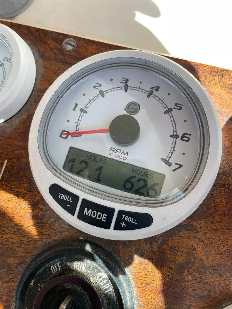 Slide: The Image of Close-up of 1984 Farallon 25 Whaleback boat RPM gauge showing 626 hours. - 18