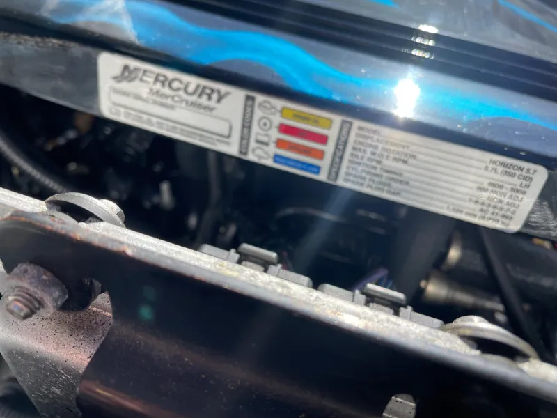 Slide: The Image of Close-up of a 1984 Farallon 25 Whaleback engine with Mercury Marine label. - 19