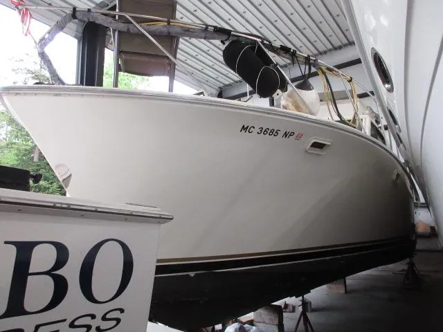 Slide: The Image of 1978 Pacemaker 40 Sport Fish boat in storage, side view. - 2