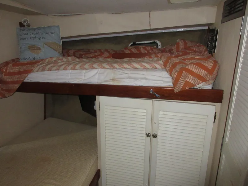Slide: The Image of 1978 Pacemaker 40 Sport Fish cabin with bunk beds and storage. - 26