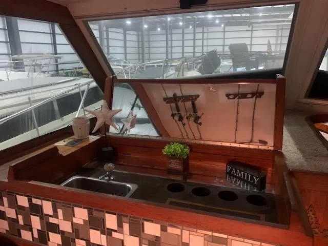 Slide: The Image of 1978 Pacemaker 40 Sport Fish boat interior with sink and decor. - 33