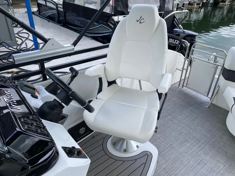 Slide: The Image of 2023 JC Neptoon Sport 23TT boat captain's chair and helm station. - 15