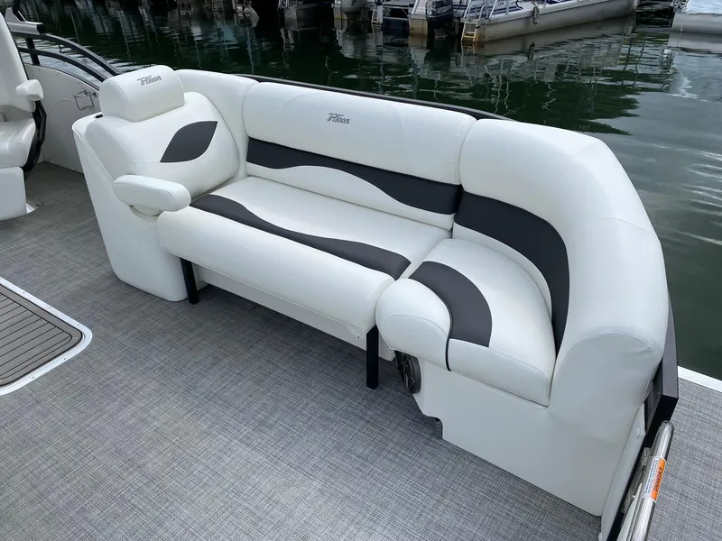 Slide: The Image of 2023 JC Neptoon Sport 23TT pontoon boat with white and gray seating. - 3