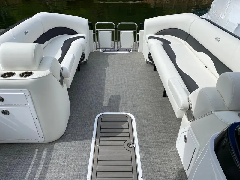Slide: The Image of 2023 JC Neptoon Sport 23TT pontoon boat interior with spacious seating and modern design. - 7