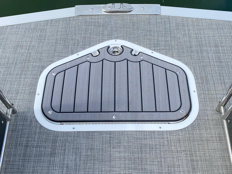 Slide: The Image of 2023 JC Neptoon Sport 23TT boat deck with textured flooring and hatch. - 8