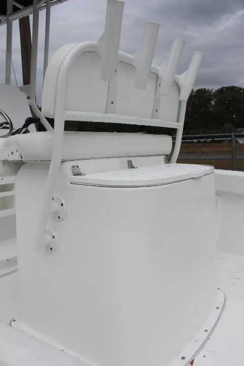 Slide: The Image of 2024 Clearwater 2200 boat with white seating and rod holders. - 10