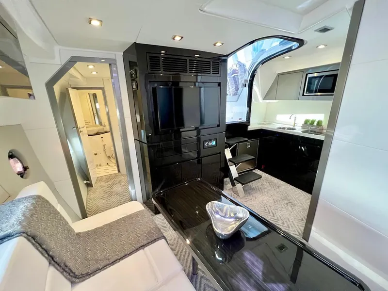Slide: The Image of Luxurious interior of 2025 Schaefer 400 Sport yacht with modern amenities and sleek design. - 16