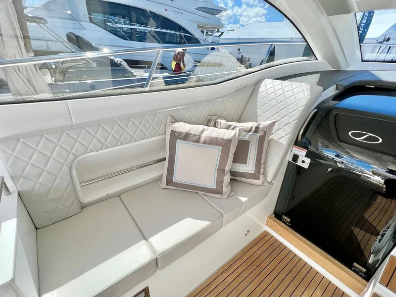 Slide: The Image of Luxurious interior of 2025 Schaefer 400 Sport yacht with plush seating and elegant design. - 29
