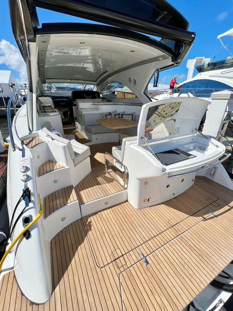Slide: The Image of 2025 Schaefer 400 Sport yacht with spacious deck and modern amenities. - 34