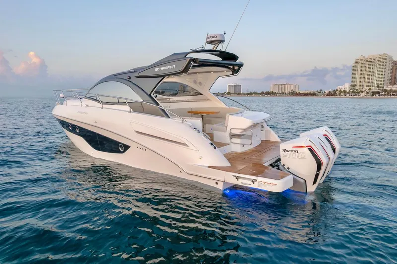 Slide: The Image of Schaefer 400 Sport 2025 yacht on water, featuring sleek design and powerful engines. - 8