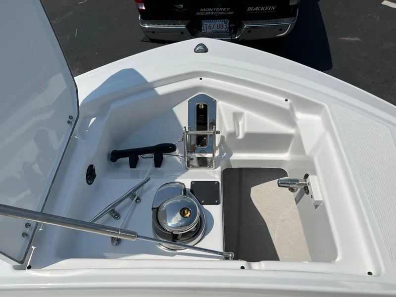 Slide: The Image of 2023 Blackfin 252 CC boat anchor storage compartment. - 27