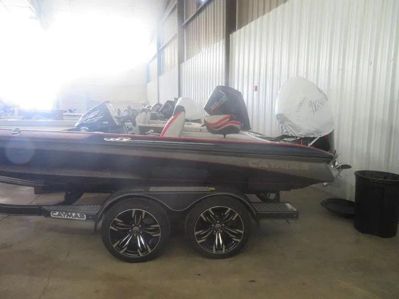 Slide: The Image of 2022 Caymas CX19 boat on a trailer in a warehouse. - 8