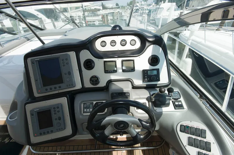 Slide: The Image of Helm of the 2005 Cruisers Yachts 520 Express. - 12