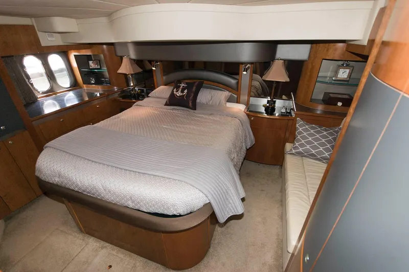 Slide: The Image of Luxurious bedroom in a 2005 Cruisers Yachts 520 Express. - 27