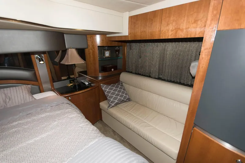 Slide: The Image of Interior of 2005 Cruisers Yachts 520 Express with sofa and bed. - 28