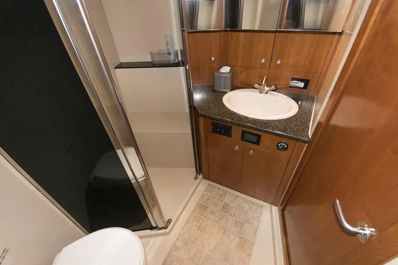 Slide: The Image of Luxurious bathroom in a 2005 Cruisers Yachts 520 Express. - 33