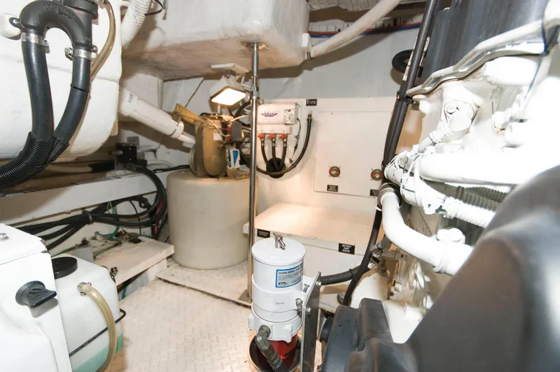Slide: The Image of Engine room of 2005 Cruisers Yachts 520 Express. - 36