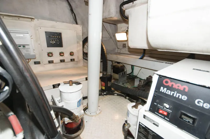 Slide: The Image of Engine room of 2005 Cruisers Yachts 520 Express. - 37