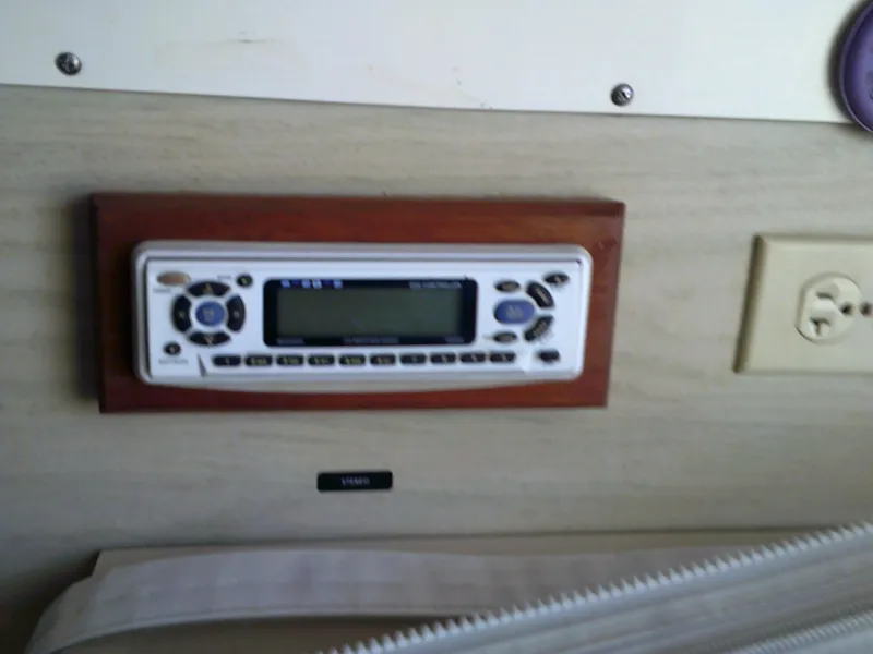 Slide: The Image of 1980 Bertram 28 Flybridge Cruiser interior control panel. - 10