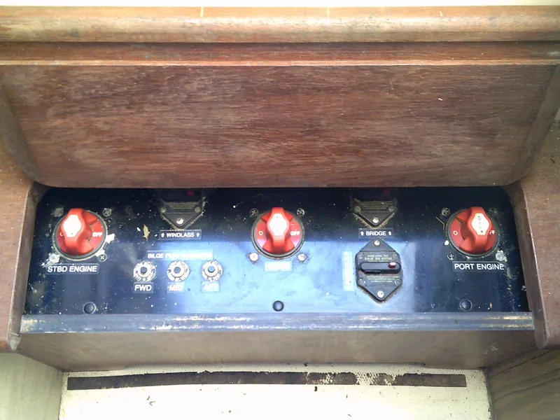 Slide: The Image of Control panel of a 1980 Bertram 28 Flybridge Cruiser boat. - 16