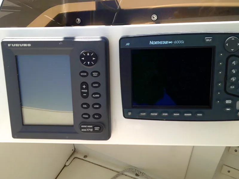 Slide: The Image of Navigation equipment on a 1980 Bertram 28 Flybridge Cruiser boat. - 21