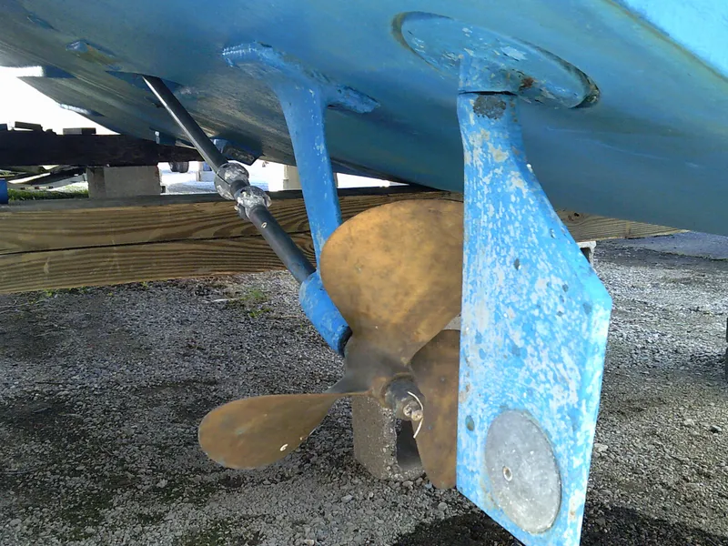 Slide: The Image of Close-up of 1980 Bertram 28 Flybridge Cruiser propeller and rudder. - 24