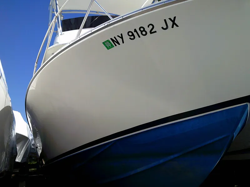 Slide: The Image of 1980 Bertram 28 Flybridge Cruiser boat with registration number NY 9182 JX. - 27