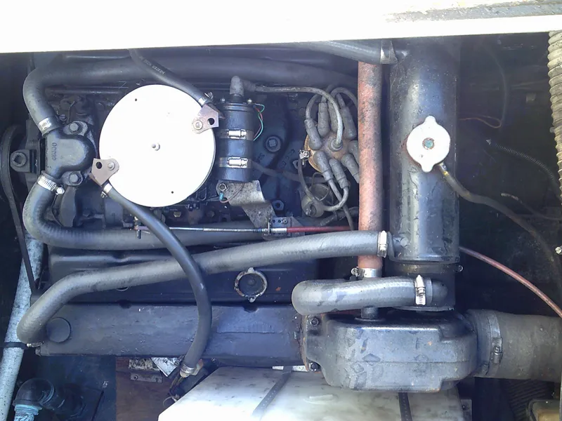 Slide: The Image of Engine compartment of a 1980 Bertram 28 Flybridge Cruiser boat. - 4