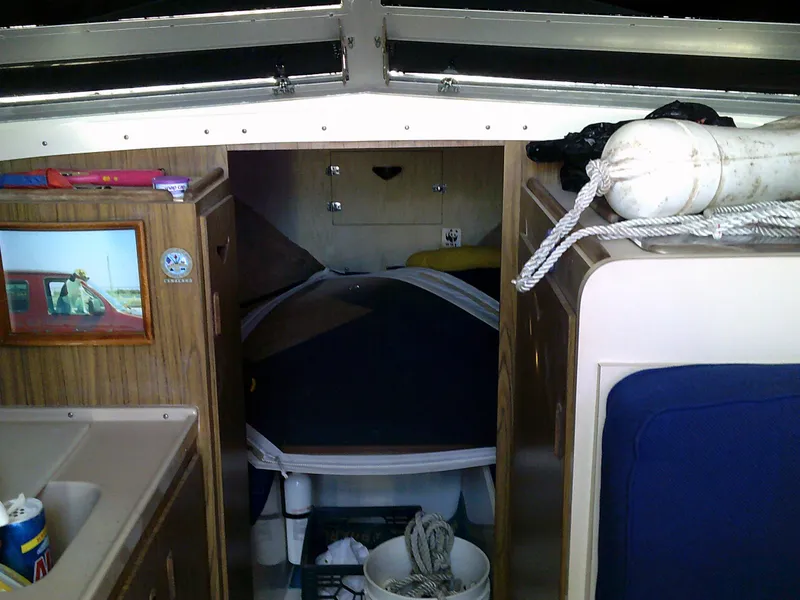 Slide: The Image of Interior of 1980 Bertram 28 Flybridge Cruiser with cabin and storage. - 8