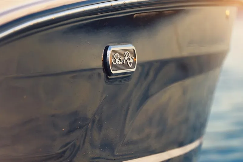 Slide: The Image of Close-up of 2023 Sea Ray SLX 260 OB boat hull with logo. - 10