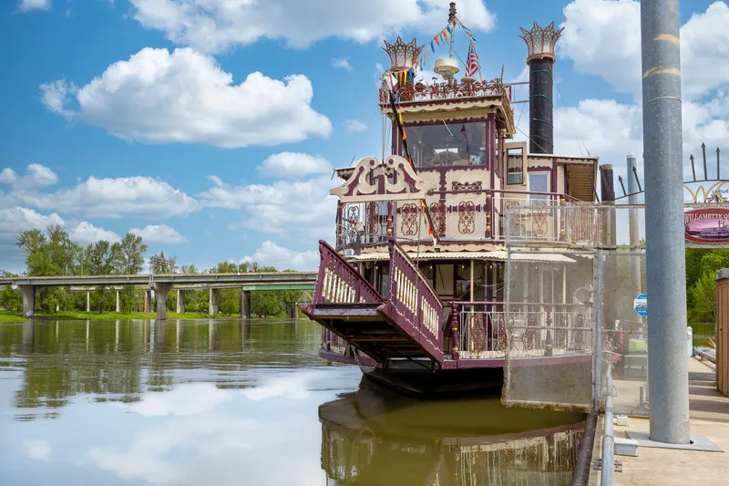Slide: The Image of Vintage 1990 Howdy Eidelman Sternwheeler docked on a sunny river with bridge in background. - 3