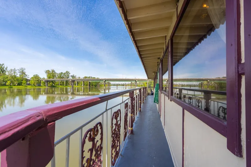 Slide: The Image of Side view of 1990 Custom Howdy Eidelman Sternwheeler on a calm river. - 47