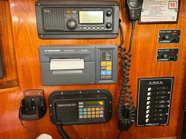 Slide: The Image of Control panel of a 1979 Palmer Johnson New York 40 Sloop with navigation and communication equipment. - 14