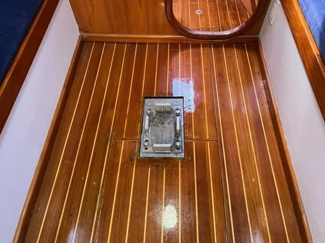 Slide: The Image of Polished wooden floor of 1979 Palmer Johnson New York 40 Sloop interior. - 17