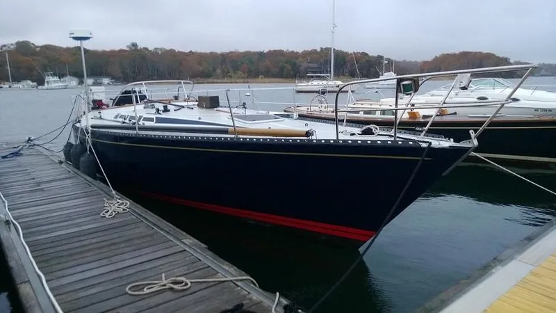 Slide: The Image of 1979 Palmer Johnson New York 40 Sloop docked at a marina. - 2