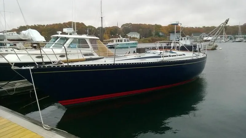 Slide: The Image of 1979 Palmer Johnson New York 40 Sloop docked in a marina. - 4