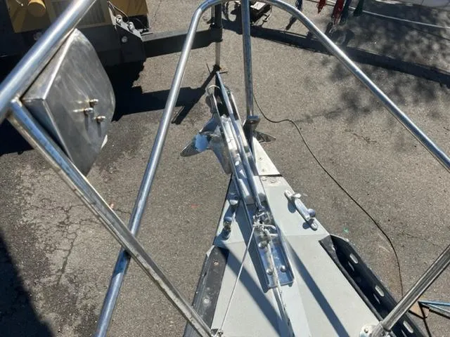 Slide: The Image of Bow of 1979 Palmer Johnson New York 40 Sloop with metal railings and anchor. - 40