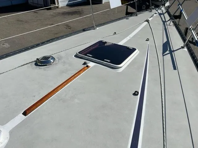 Slide: The Image of 1979 Palmer Johnson New York 40 Sloop deck with hatch and rigging details. - 41
