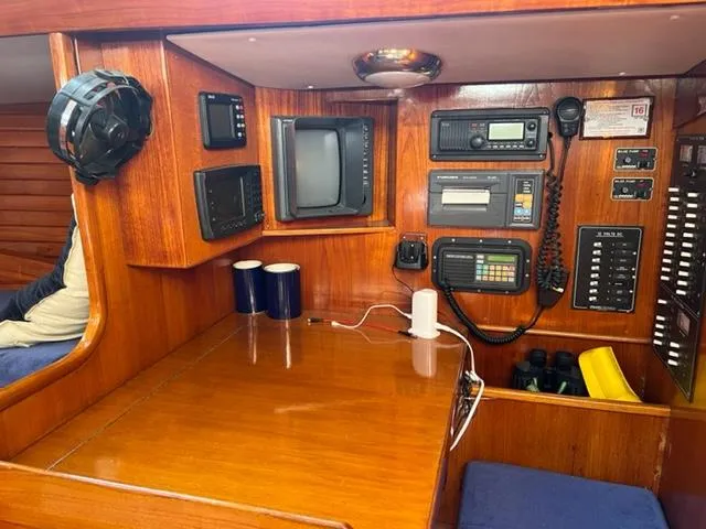 Slide: The Image of Interior of a 1979 Palmer Johnson New York 40 Sloop with navigation equipment. - 7