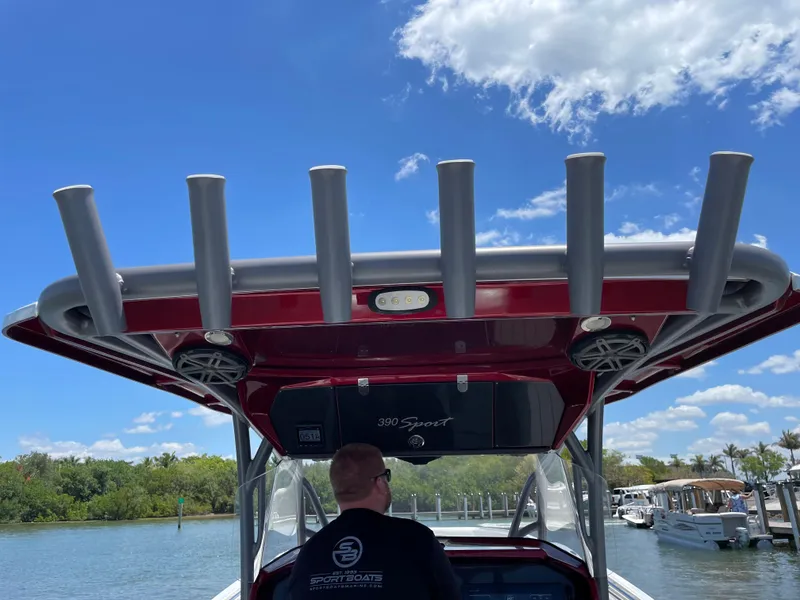 Slide: The Image of 2017 Nor-Tech 390 Sport boat on the water with a clear blue sky. - 33