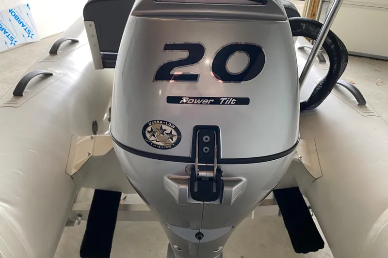 Slide: The Image of 2022 Brig Falcon 330 inflatable boat with a 20 HP outboard motor. - 6