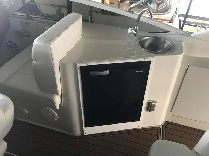 Slide: The Image of 2002 Carver 396 Aft Cabin MY yacht kitchenette with sink and mini fridge. - 17