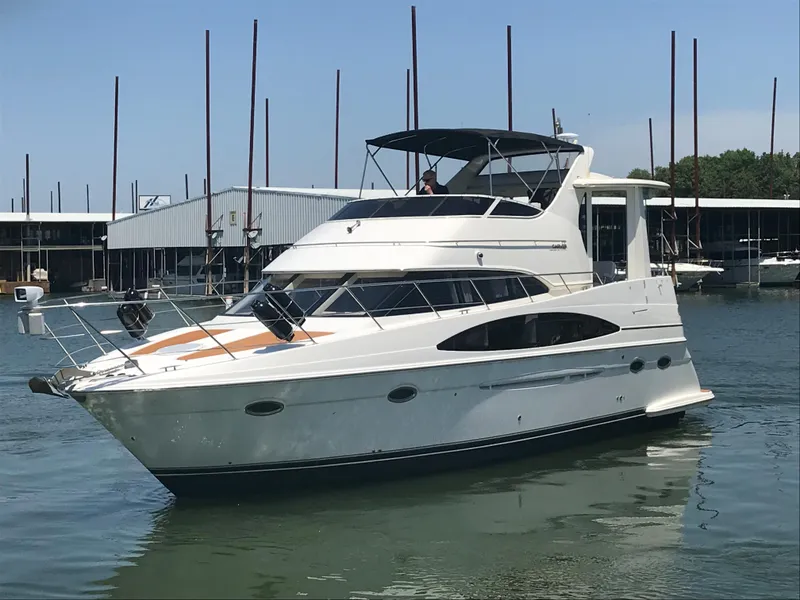 Slide: The Image of 2002 Carver 396 Aft Cabin MY yacht docked in marina. - 4