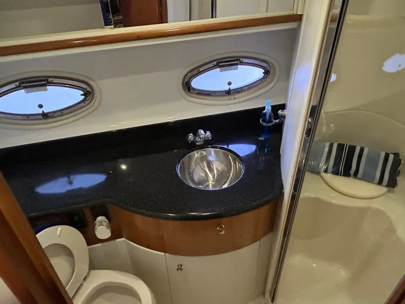 Slide: The Image of Bathroom interior of 2002 Carver 396 Aft Cabin MY yacht with sink and shower. - 43