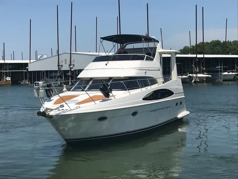 Slide: The Image of 2002 Carver 396 Aft Cabin MY yacht docked in marina, sunny day. - 5