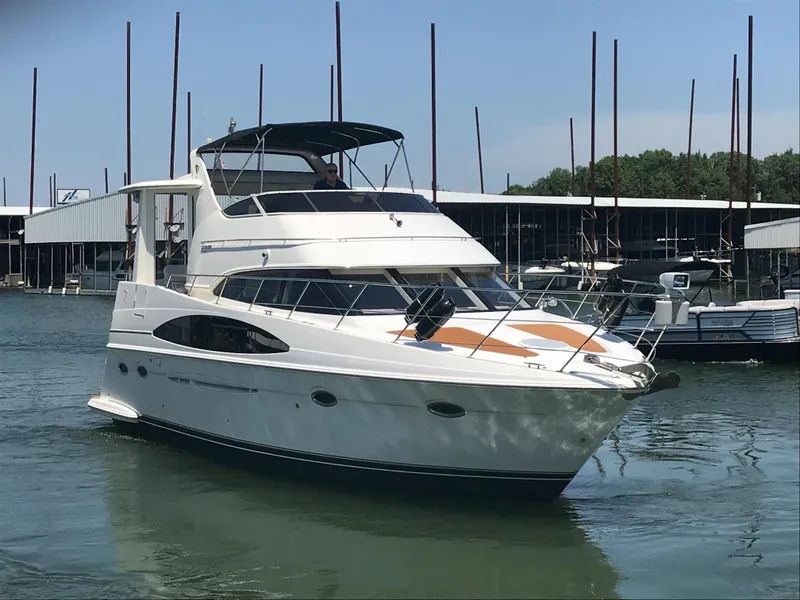 Slide: The Image of 2002 Carver 396 Aft Cabin MY yacht docked in marina, sunny day. - 7