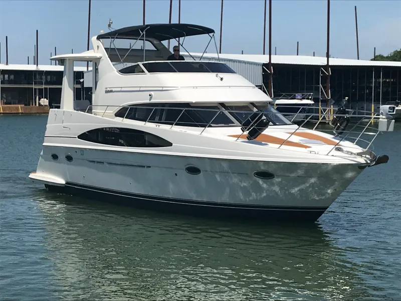 Slide: The Image of 2002 Carver 396 Aft Cabin MY yacht docked in marina. - 12