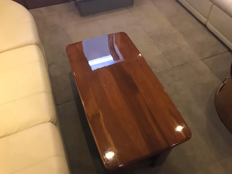 Slide: The Image of Polished wooden table in 2002 Carver 396 Aft Cabin MY interior. - 24